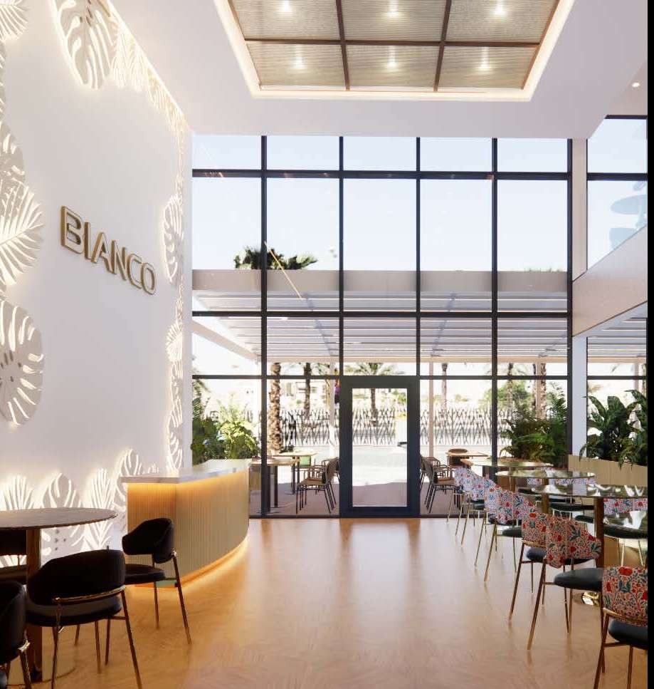 Bianco feature wall with backlit botanical relief and a curved counter